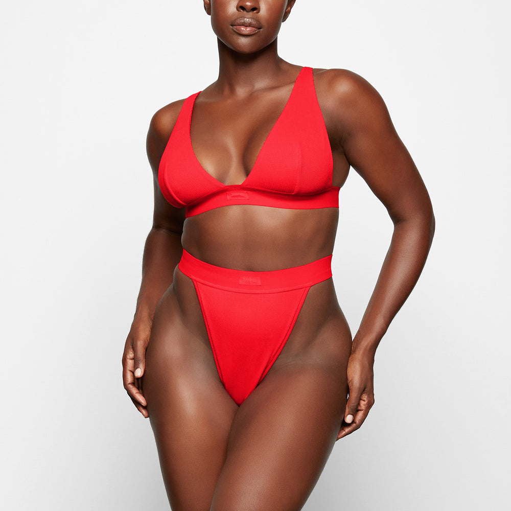 Skims COTTON RIB Thong Rood | HUW-912608