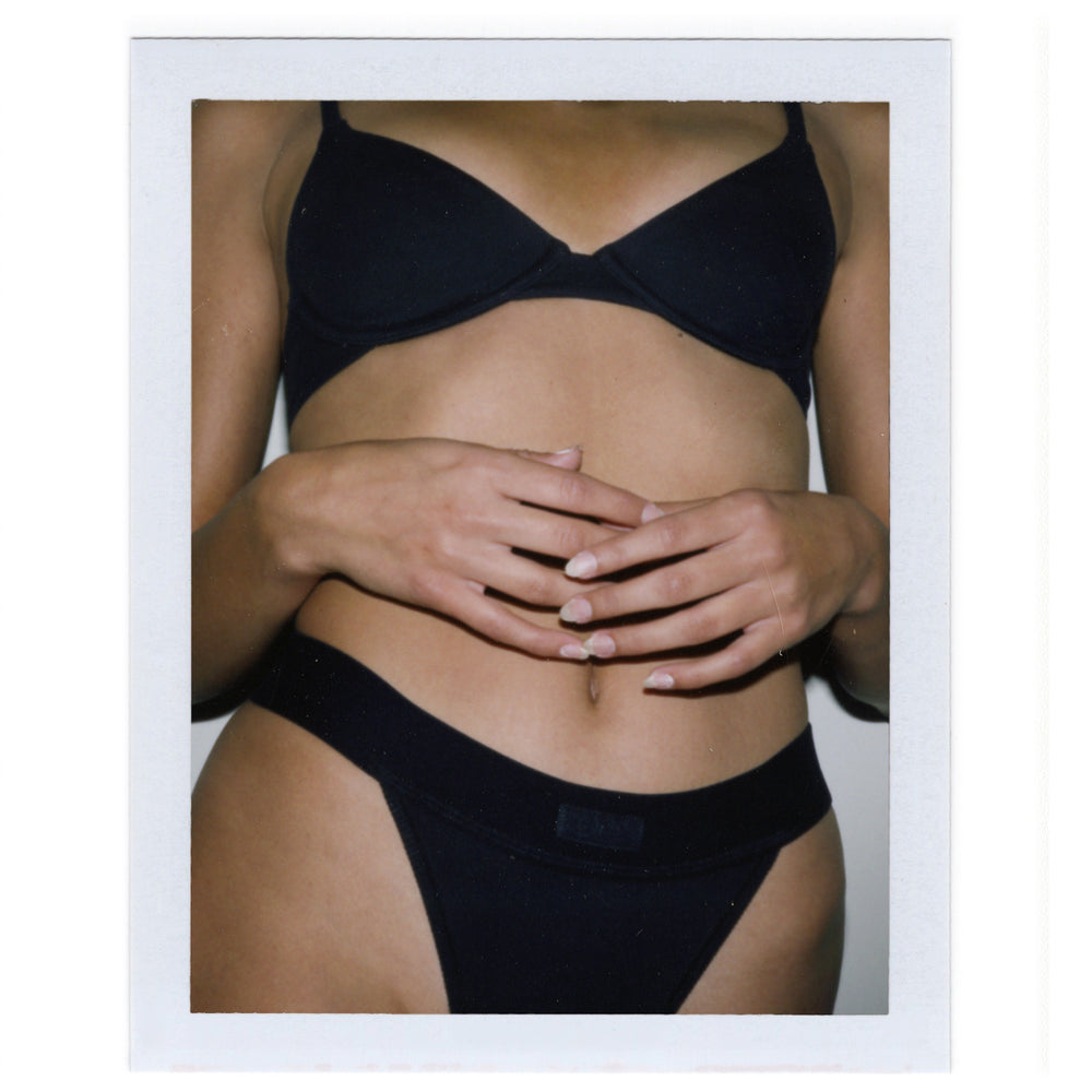 Skims COTTON RIB Thong Zwart | KQO-360571