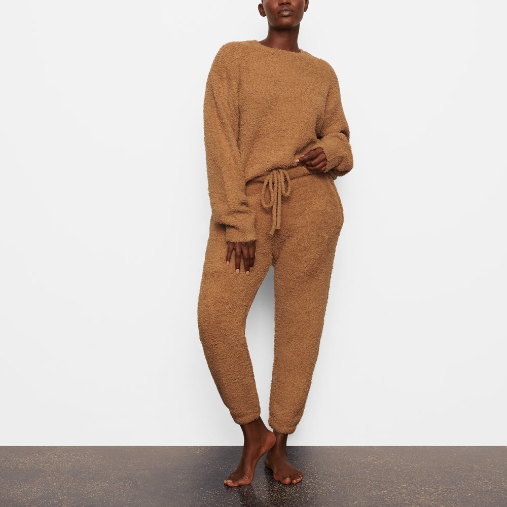 Skims COZY KNIT UNISEX Joggers Bruin | MAV-987243