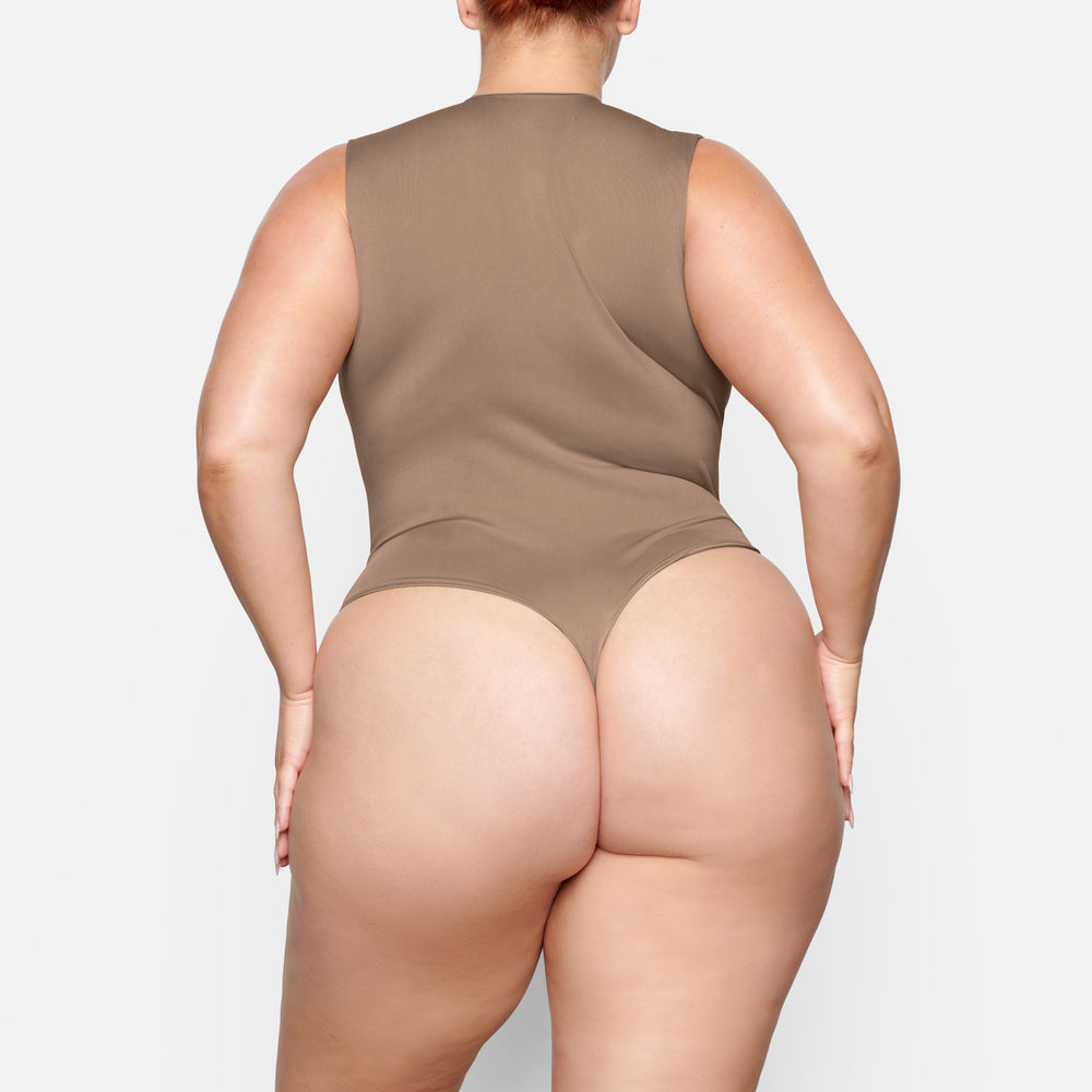 Skims ESSENTIAL CREW NECK Sleeveless Bodysuit Abrikoos | EQV-930621