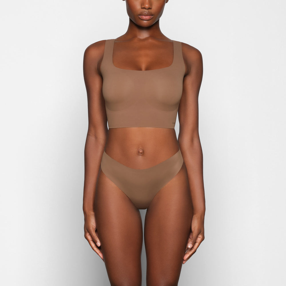 Skims FREE CUT MID WAIST Thong Abrikoos | DWV-312657