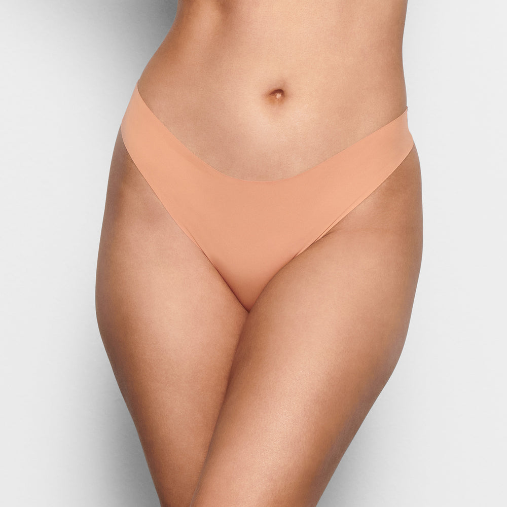 Skims FREE CUT MID WAIST Thong Beige | OIP-159276