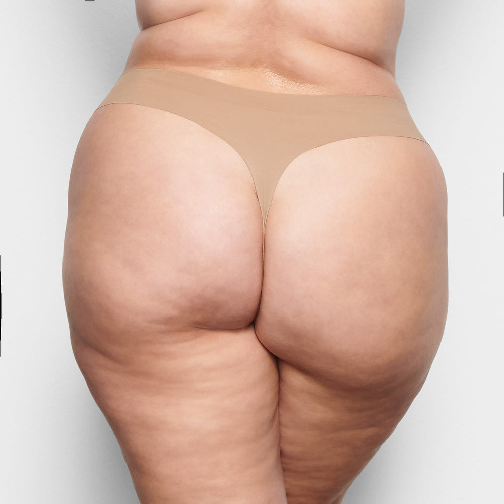 Skims FREE CUT MID WAIST Thong Beige | VNA-729863