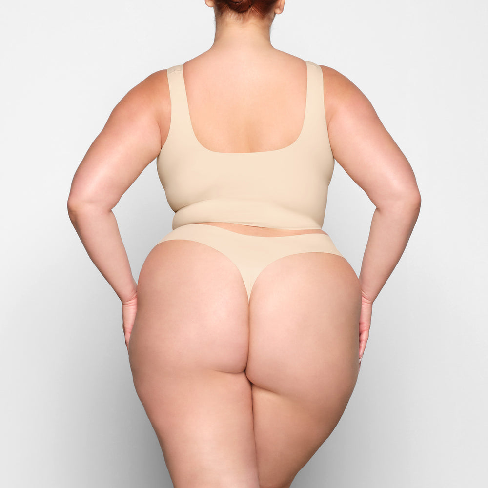 Skims FREE CUT MID WAIST Thong Bruin | BKN-741598