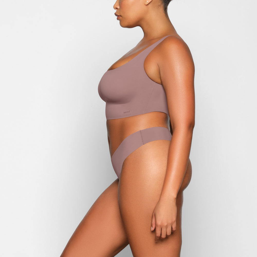 Skims FREE CUT MID WAIST Thong Bruin | RJH-736201