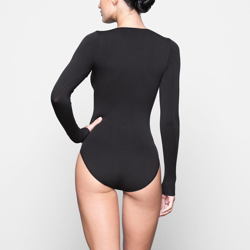 Skims LIGHT ESSENTIAL CREW NECK Long Sleeve Bodysuit Zwart | ASH-357840