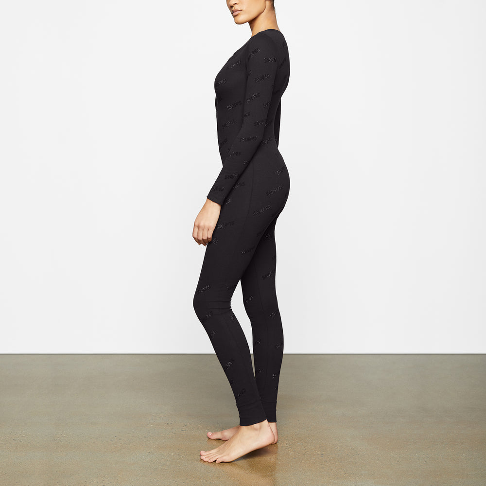 Skims RHINESTONE LOGO POINTELLE Onesie Zwart | MTK-254368