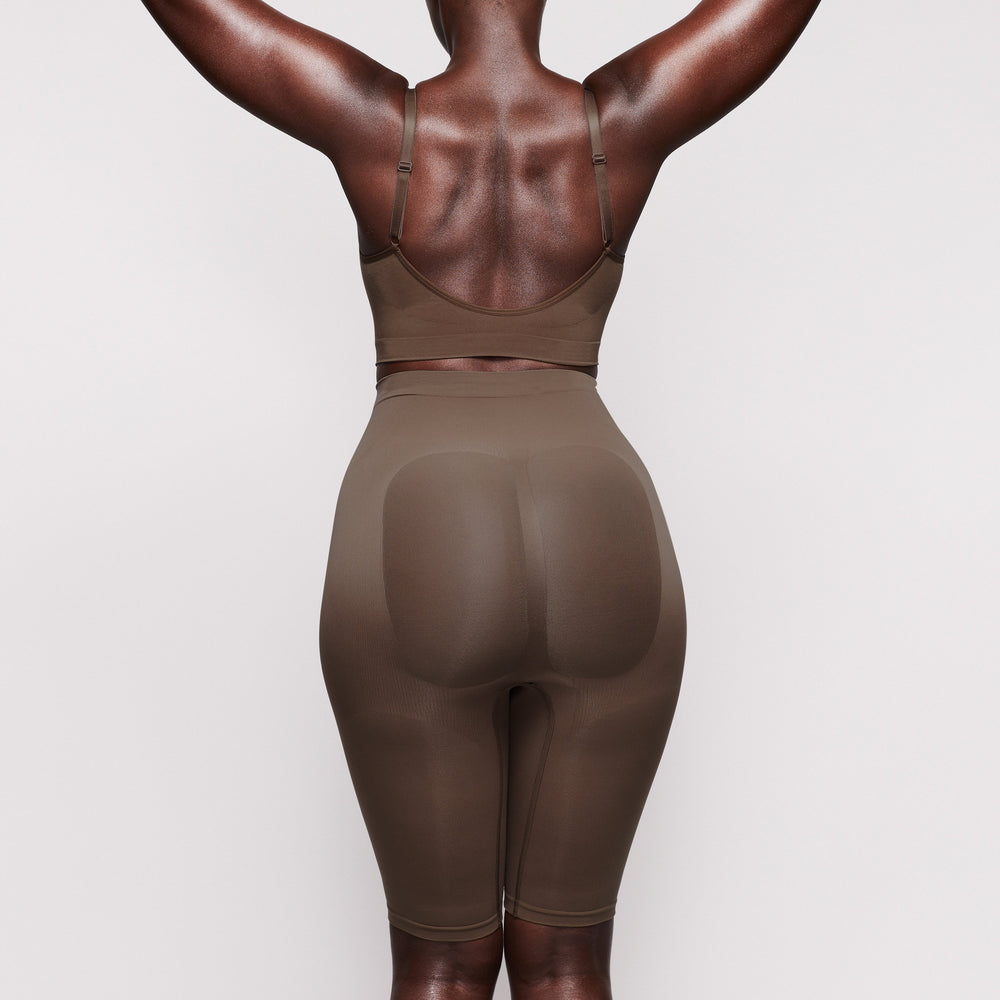 Skims SCULPTING ABOVE THE KNEE Korte Broek Abrikoos | DHG-512870