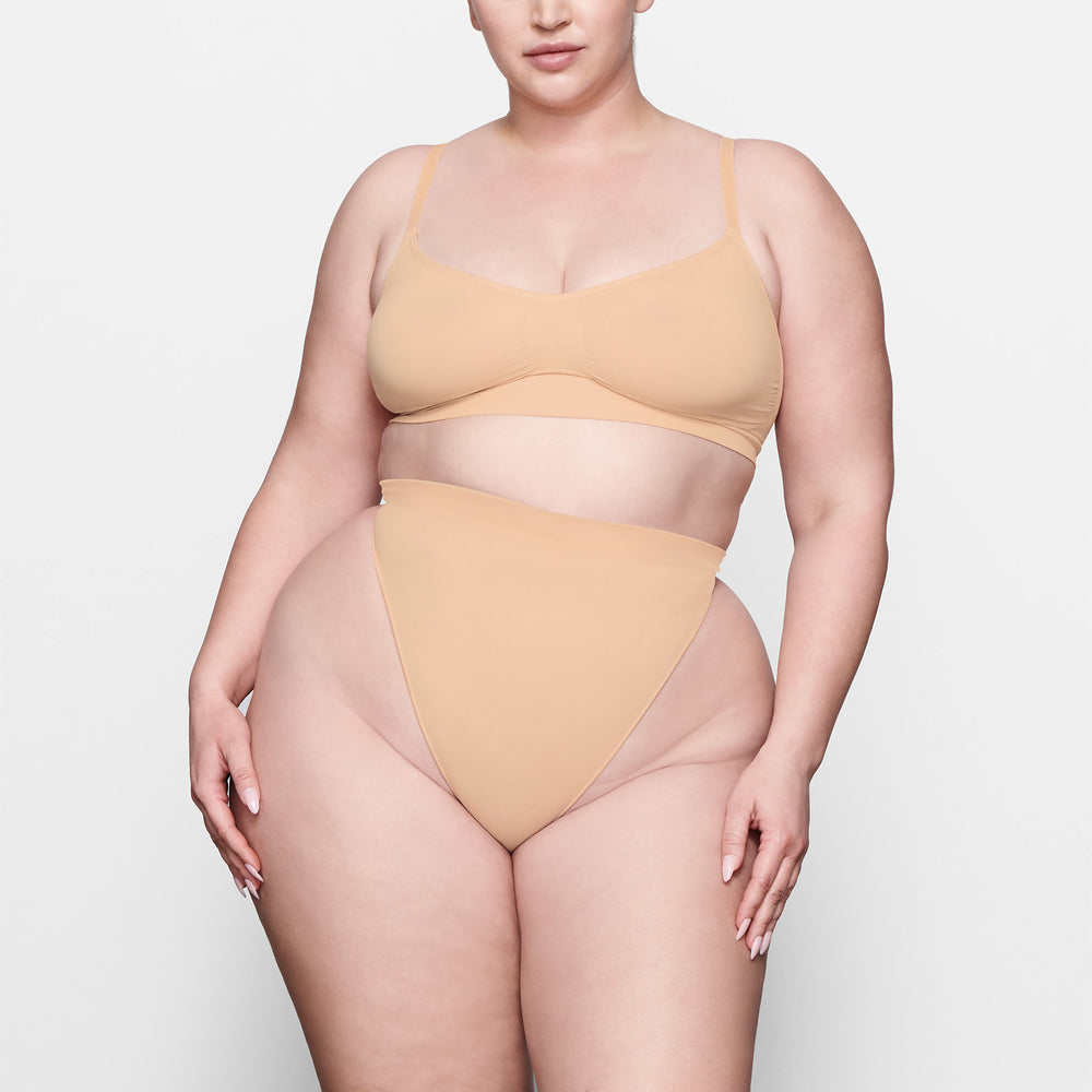Skims SCULPTING MID WAIST Thong Beige | RBJ-312750