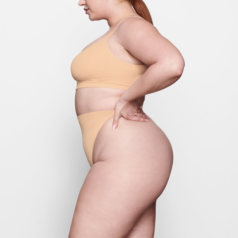 Skims SCULPTING MID WAIST Thong Beige | RBJ-312750