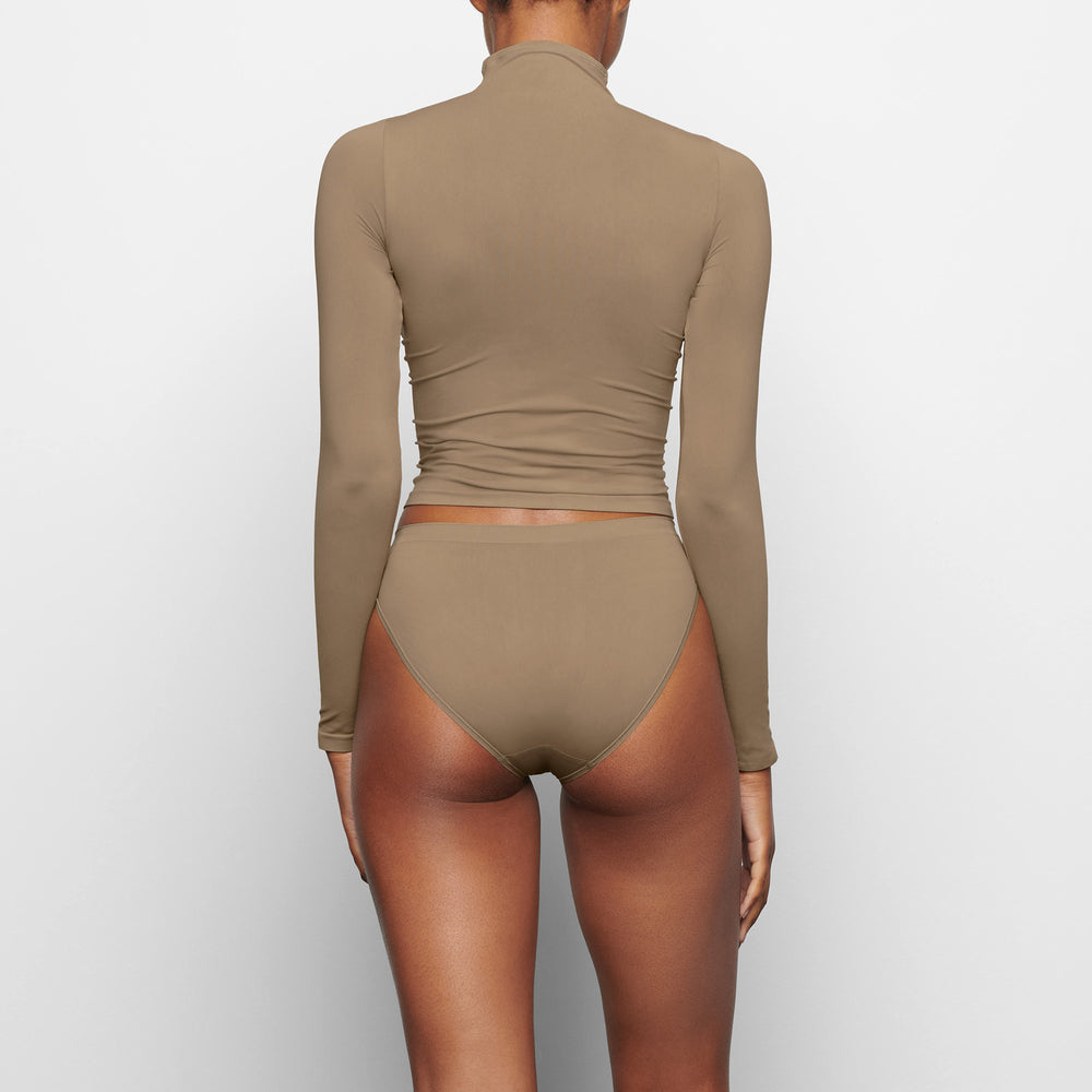 Skims SOFT SMOOTHING TURTLENECK TOP T-shirt Abrikoos | ORE-102496