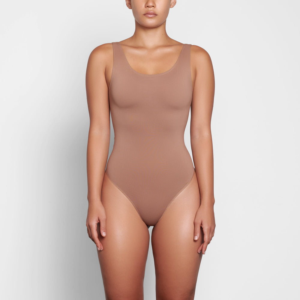 Skims SOFT SMOOTHING Thong Bodysuit Abrikoos | KDS-857460