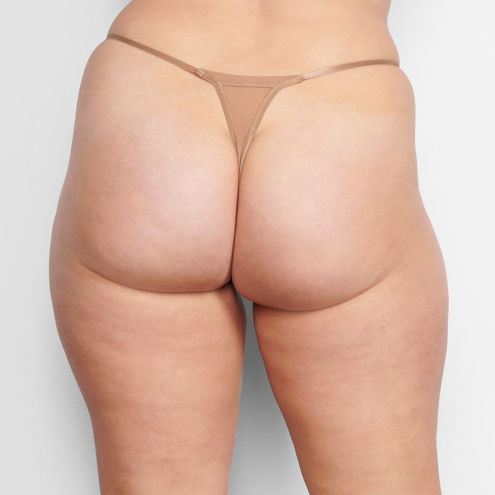 Skims SUMMER MESH STRING Thong Abrikoos | EQP-608754