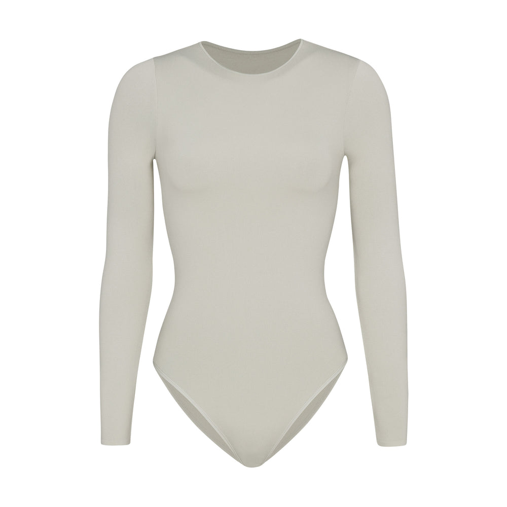 Skims LIGHT ESSENTIAL CREW NECK Long Sleeve Bodysuit Wit | OQK-625870