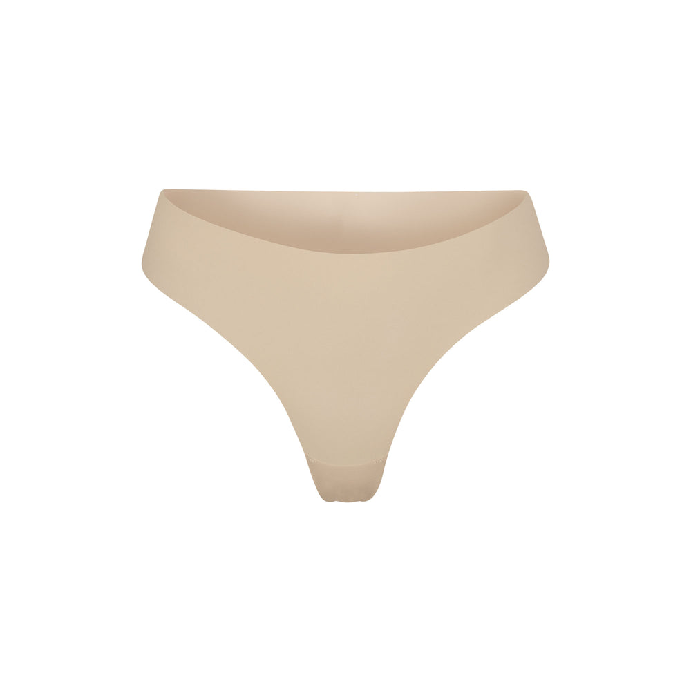 Skims NAKED Thong Bruin | PQI-081457